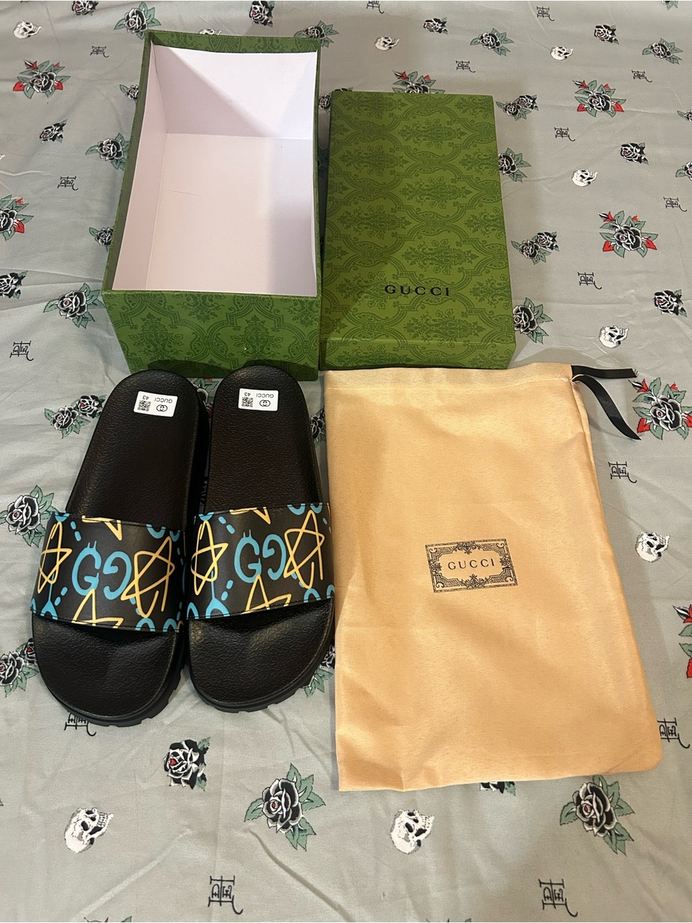 Gucci Black Slides with Blue and Yellow Graphic Strap